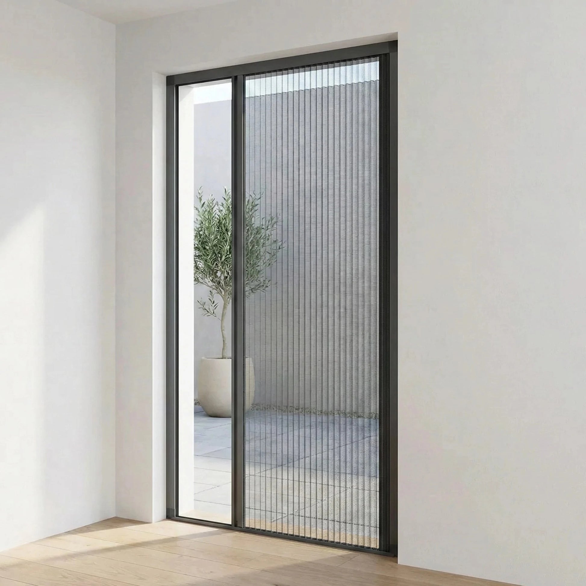 Enkele plissé hordeur met antraciet aluminium frame en fijn geplisseerd gaas, geschikt voor een deur of schuifpui.
